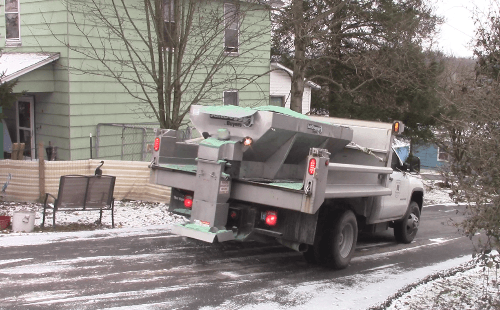 A Morgantown Public Works Salt Truck spreading salt.