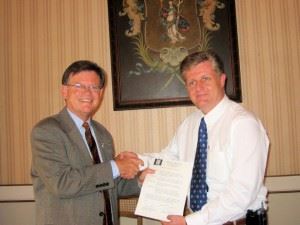 Two men shaking hands in Guanajuato, Mexico